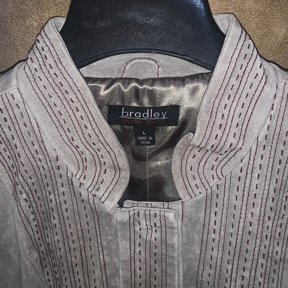 New with tags.  Bradley suede jacket with stitch details